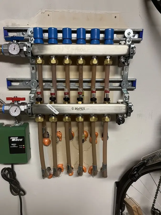 Plumber performing Water Heater Repair at a residential property in Lochbuie